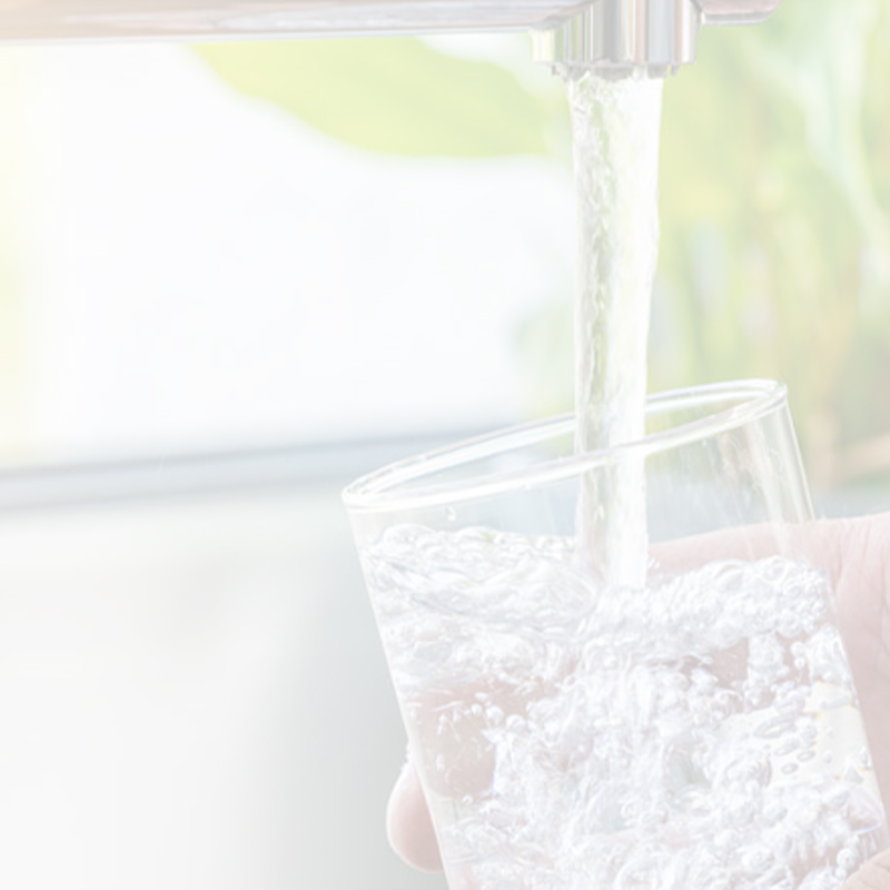 filling water under faucet