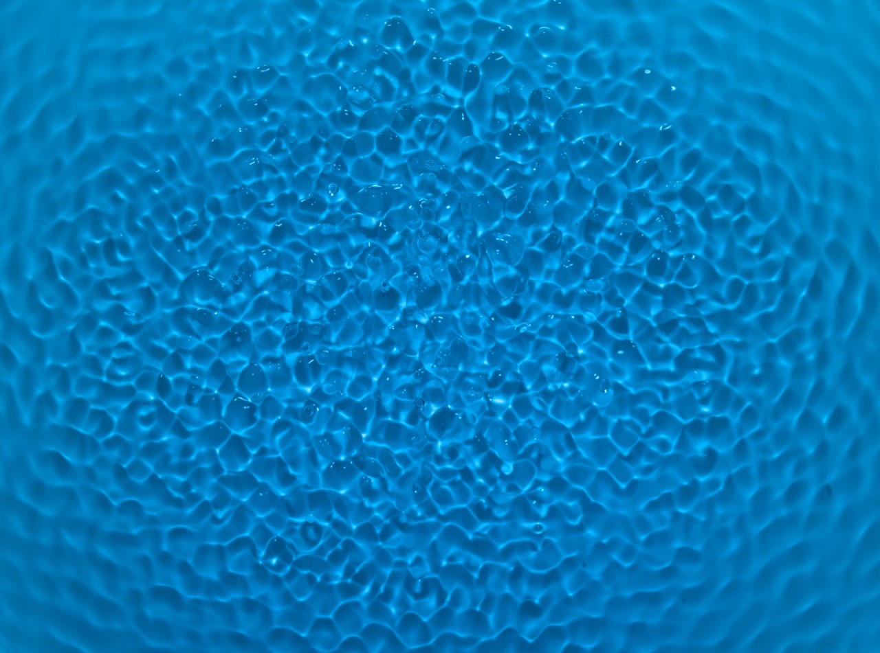 Regular water texture. The form of chladni on the water.
