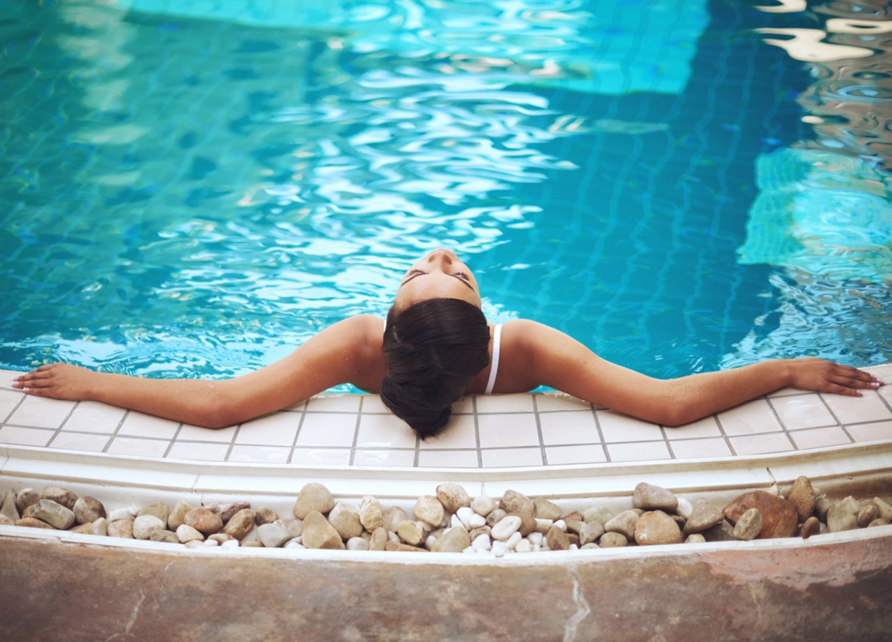 woman relaxing in pool